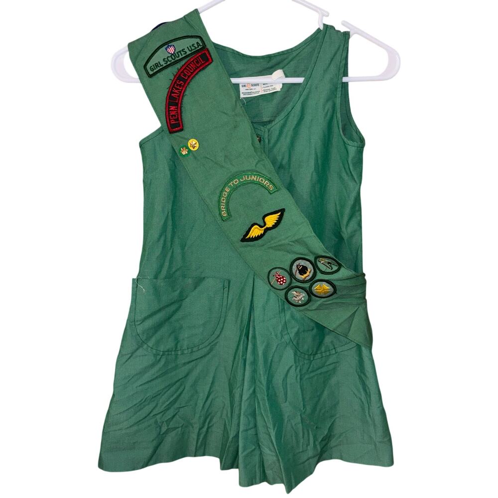 Vintage Girl Scouts 1970’s green jumper dress and sash with patches (size 7)